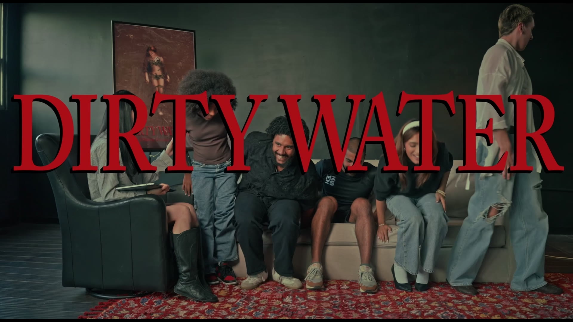 The Dirty Water cast seated together with the bold red Dirty Water title overlaid.